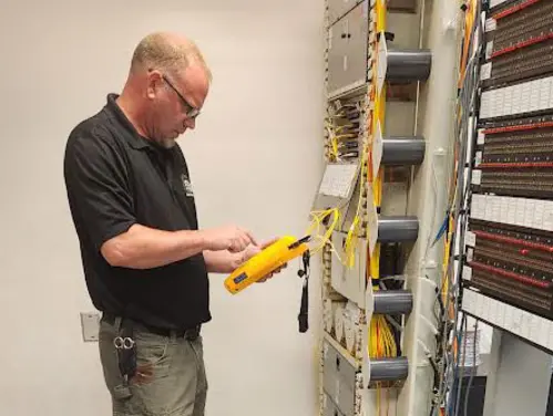 Technician using equipment to test