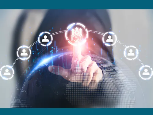 A hand pointing at a glowing digital icon of a handshake and gears, surrounded by an arch of connected user profile icons over a digital globe.