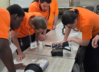 students splicing fiber