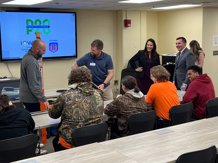 Students viewing an demonstration of fiber optics
