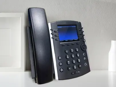 Photo of an MVS handset on a desk